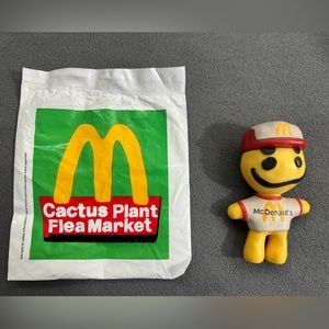 McDonald’s Cactus Plant Flea Market Toy with packaging and happy meal box